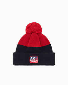 Armani Exchange Berretto blu e rosso in maglia a coste con pompon